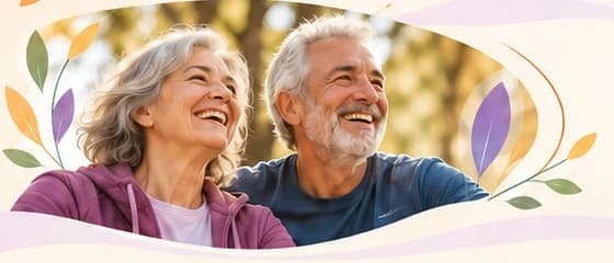 Pareja de adultos riendo al aire libre.